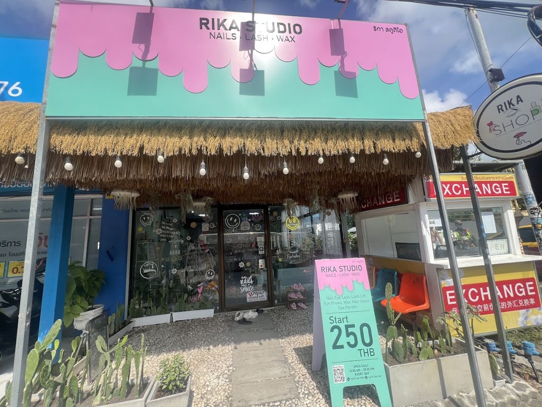 RIKA STUDIO storefront with a mint and pink sign